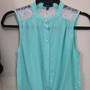 light blue colored button up blouse